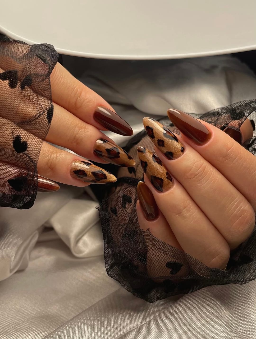 Brown leopard-print long almond nails